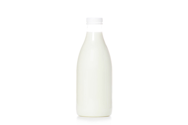 Botella de leche sobre fondo blanco
 - Foto, imagen