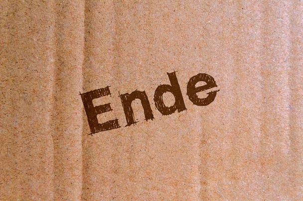 ende - cartón, cartón con letras marrones
 - Foto, Imagen