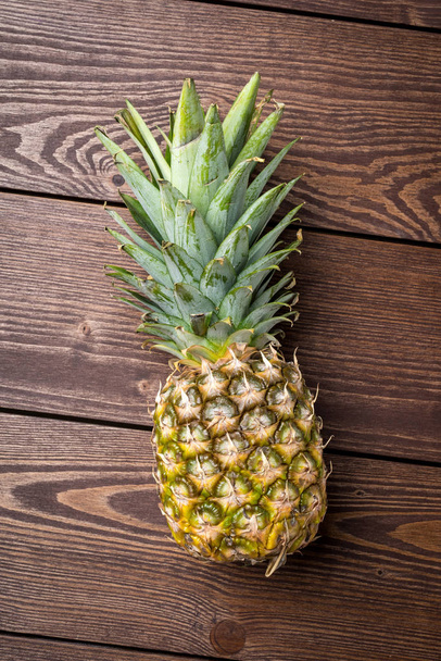 Fresh pineapple on wooden background - Fotoğraf, Görsel
