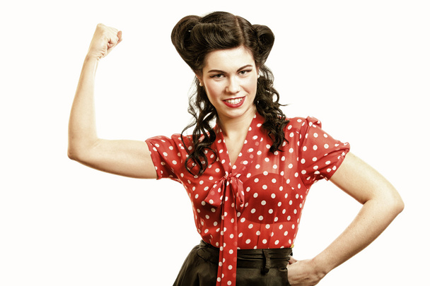 cheerful pin up woman flexing biceps isolated - Foto, immagini