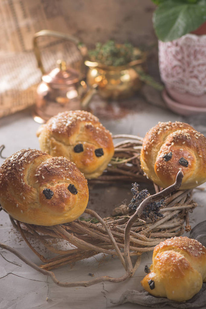 Easter bird brioche bread. Traditional Russian spring baking. Bird in the nest. - Photo, Image