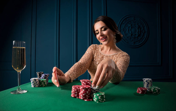 Young beautiful woman in casino - Fotó, kép