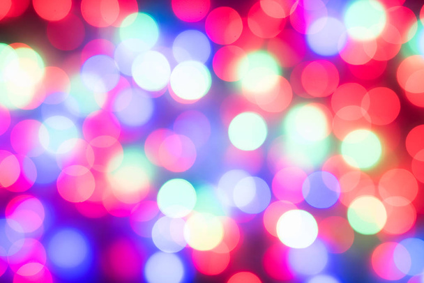 Luces desenfocadas de Navidad. Fondo colorido
 - Foto, Imagen
