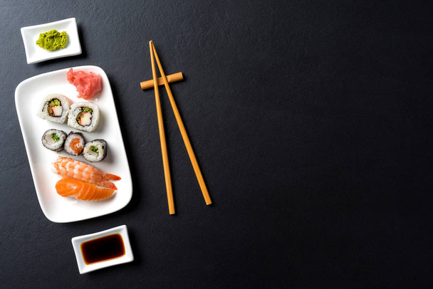 Japanese sushi with soy sauce and wasabi - Фото, зображення