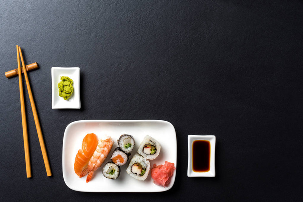 Japanese sushi with soy sauce and wasabi - Фото, зображення