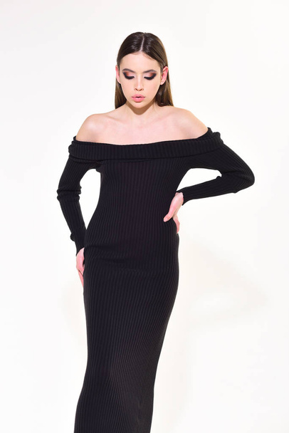 fashion model with stylish hair and makeup on pale face in elegant black dress. Fashion look concept. - Zdjęcie, obraz
