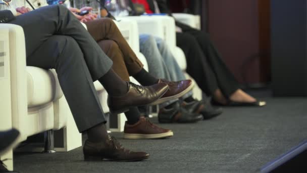 Legs of people who speakers at the business conference - Footage, Video