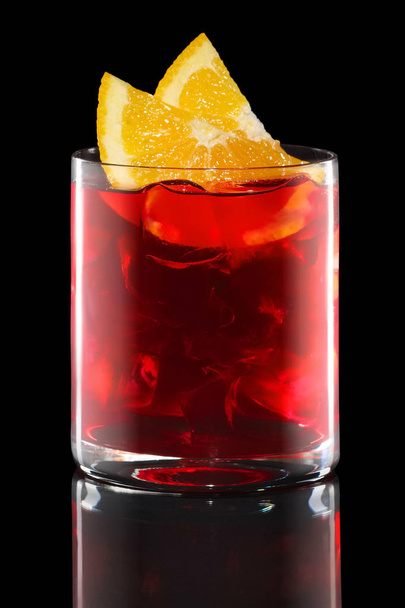 Campari and tonic in Rocks glass isolated on black - Fotoğraf, Görsel