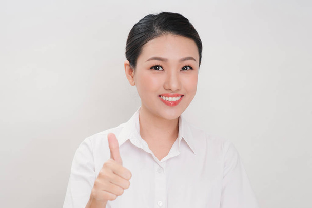 Asian business woman are smiling and Thump up sign for working happy on white background - Photo, Image