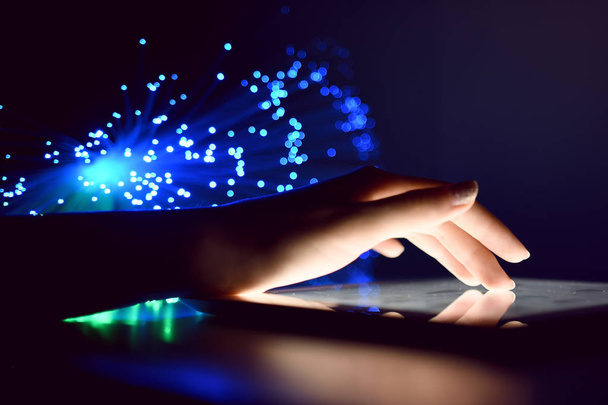 Woman Hand Touching Tablet Screen Browsing Internet On Blurry Fiber Optic Bokeh Background Technology Concept - Photo, Image