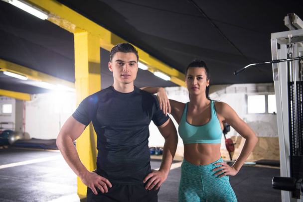 portrait of young healthy athletic people training at cross fitness gym - Fotoğraf, Görsel