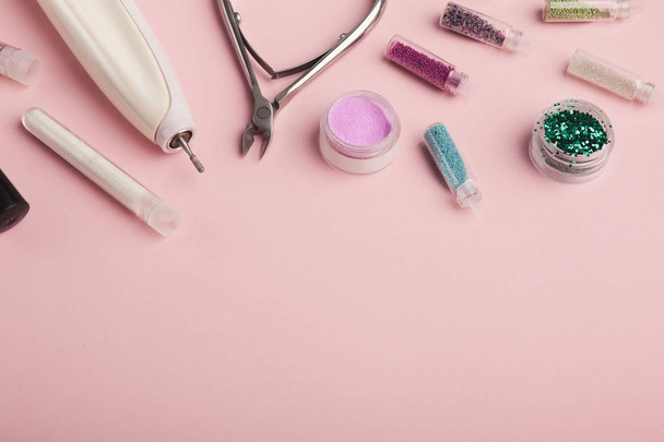 Manicure supplies on pink background - Φωτογραφία, εικόνα