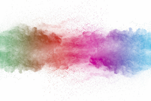 Explosión de polvo multicolor sobre fondo blanco
. - Foto, imagen
