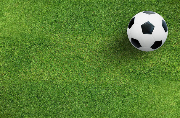 Voetbal voetbal op groene gras van voetbal veld achtergrond met patroon en textuur. - Foto, afbeelding
