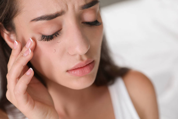 Young woman with eyelash loss problem, closeup - Foto, immagini