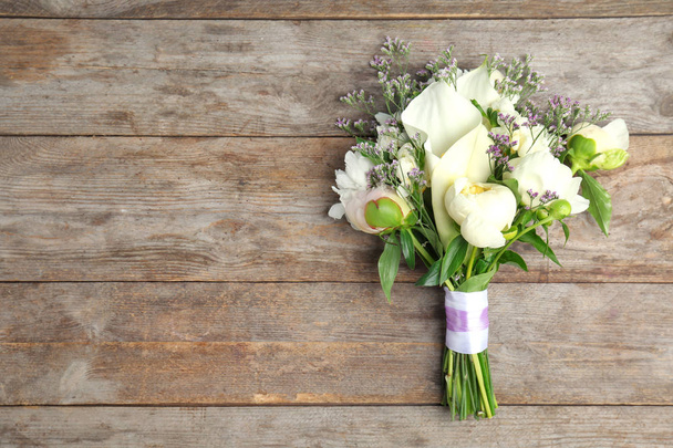 Bouquet of beautiful fragrant flowers on wooden background - Fotografie, Obrázek