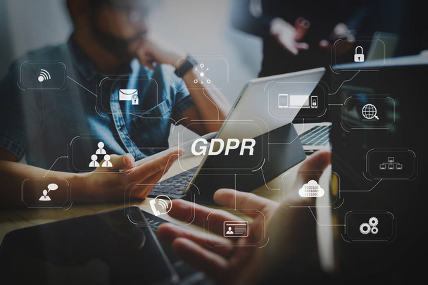 GDPR. Data Protection Regulation with Cyber security and privacy virtual diagram.StartUp Programming Team. Website designer working digital tablet dock keyboard and computer laptop with smart phone and compact server. - Фото, зображення