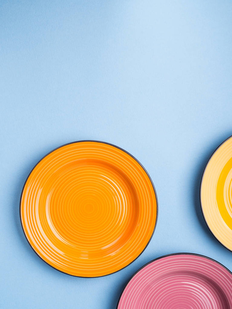 Colorful ceramic dishes. Flat lay - 写真・画像