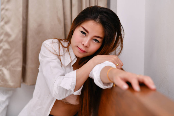 Sexy women concept. Sexy Asian girls are playing in the bedroom. - Фото, зображення