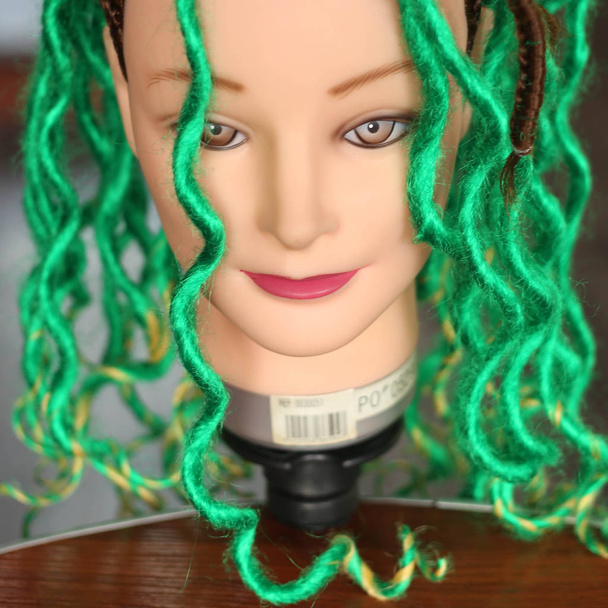 artificial dreadlocks on a mannequin, artificial hair - Photo, Image