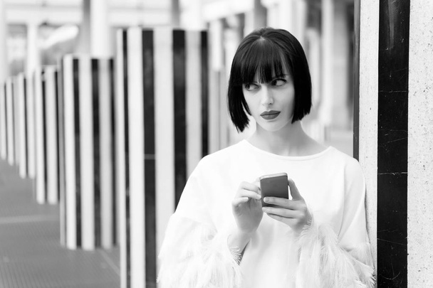 Girl use mobile phone in paris, france - Fotó, kép