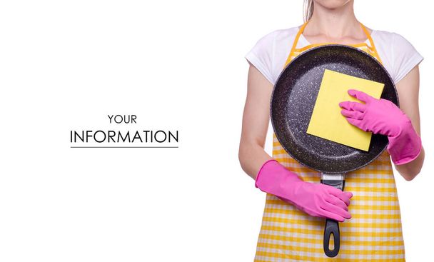 Mulher em um avental nas mãos de luvas de limpeza um padrão de panela de ato de fritar
 - Foto, Imagem