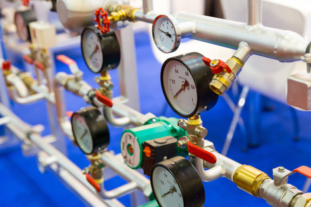 Manometers and pressure control gauges, plumbing equipment. Measure devices - Photo, Image