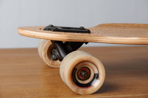 Close up of Drop through mount of pintail longboard and truck with wheels
. - Фото, изображение