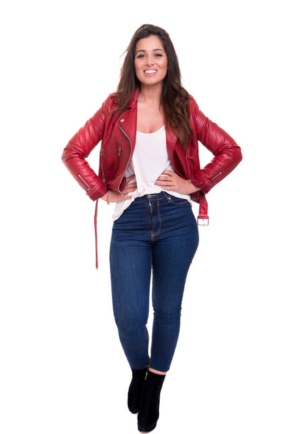 Studio shot of young casual woman on white background - Foto, Imagen