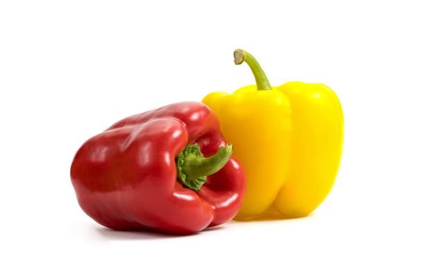 red pepper and yellow pepper on a white background - Foto, Bild