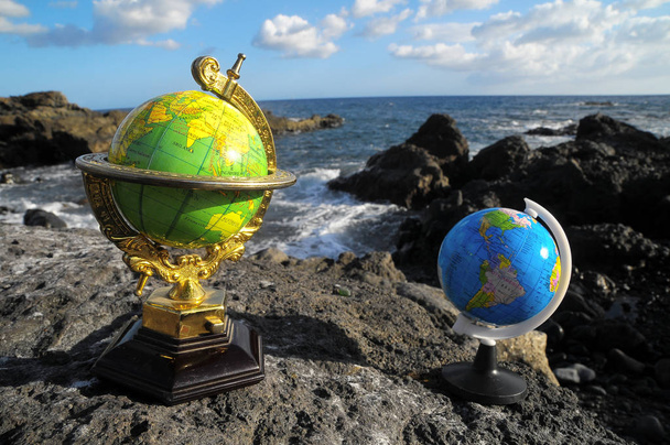 Ancient Vintage Globes Planet Earth near the Atlantic Ocean - Photo, Image