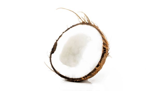 halbe Kokosnuss auf weißem Hintergrund - Foto, Bild