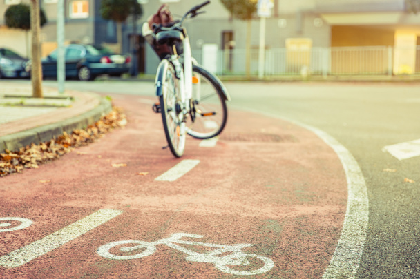 Bicycle road symbol over street bike lane with bicycle - Fotoğraf, Görsel