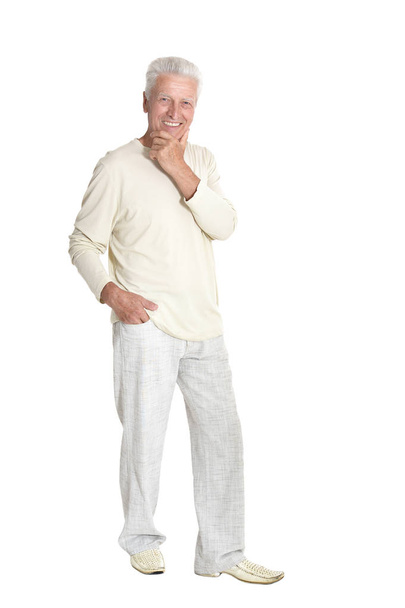 portrait of senior man  posing isolated on white background, full length  - 写真・画像