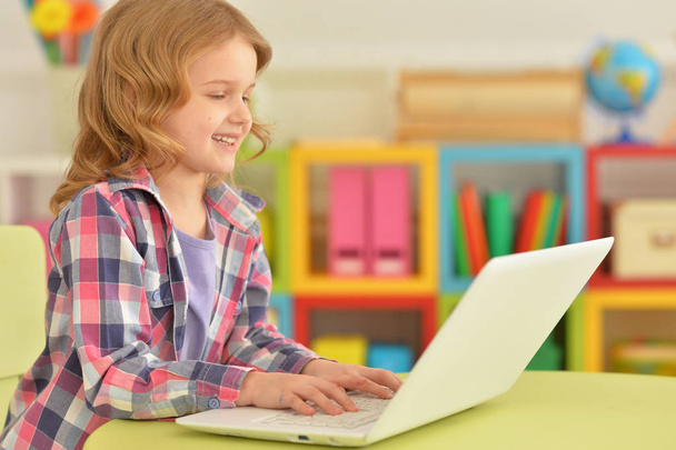 girl using modern laptop - Фото, изображение