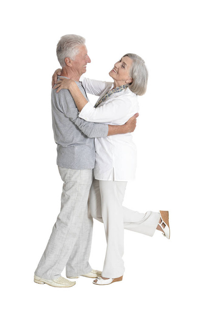 portrait of  senior couple dancing  isolated on white background - Foto, afbeelding
