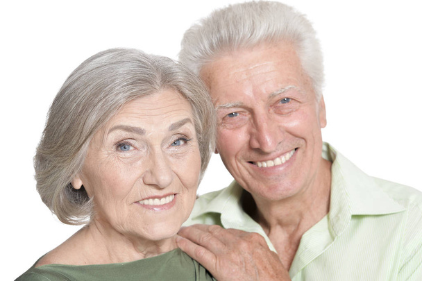portrait of  senior couple hugging   isolated on white background - Photo, image