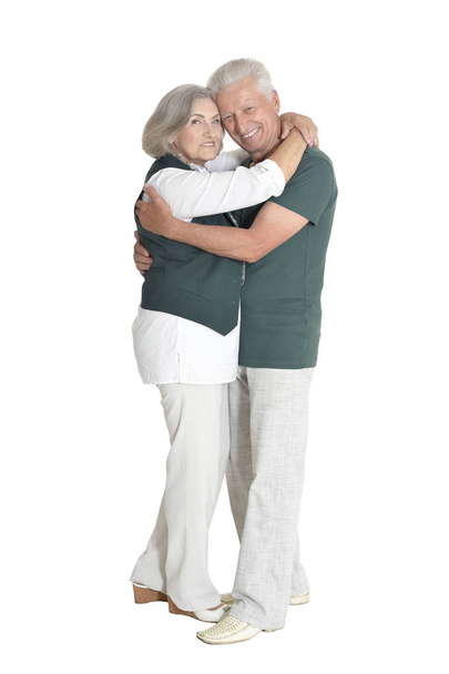 portrait of  senior couple hugging  isolated on white background, full length - Фото, зображення