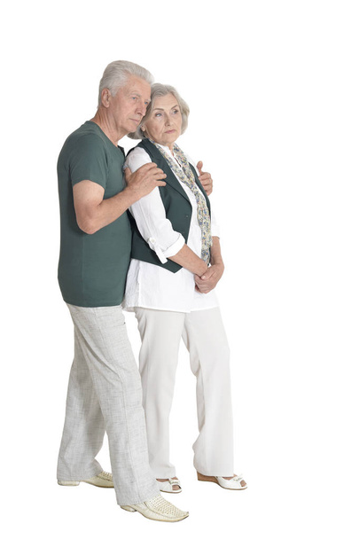 portrait of  senior couple hugging  isolated on white background, full length - Foto, Imagen