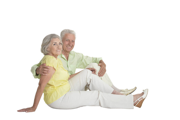 portrait of  senior couple hugging  isolated on white background, full length - Zdjęcie, obraz