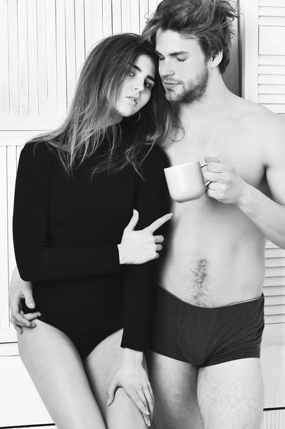 couple of bearded man with cute sexy girl holding cup - Fotografie, Obrázek