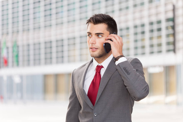 Handsome businessman talking on the phone  - Foto, Imagem