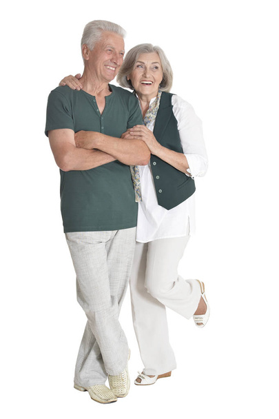 portrait of  senior couple hugging  isolated on white background, full length - Foto, afbeelding
