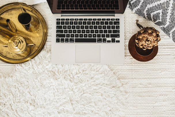 Top view decorated home office desk workspace laptop. Flat lay modern styled business concept. Blog or social media hero header. Minimal boho background. - Photo, Image