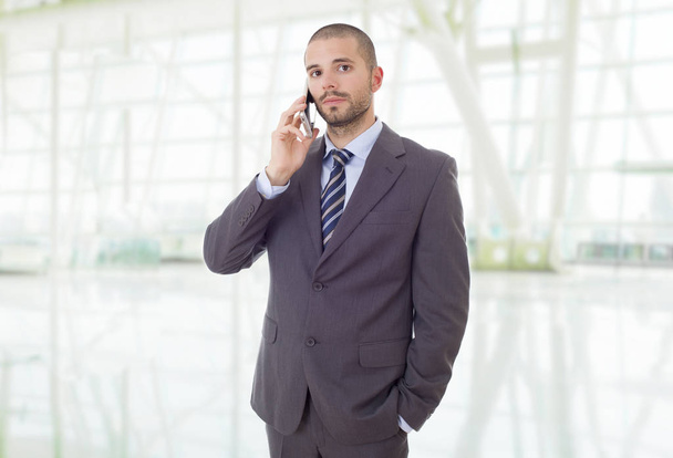 worried business man on the phone, at the office - Φωτογραφία, εικόνα
