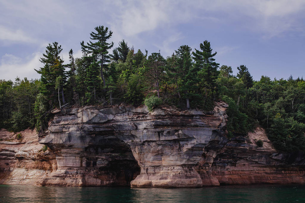 Pictured rocks national park on the Lake Superior, USA. Colorful textured rocks background - Foto, immagini