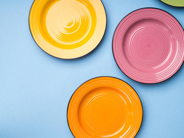 Colorful ceramic dishes. Flat lay - Foto, afbeelding