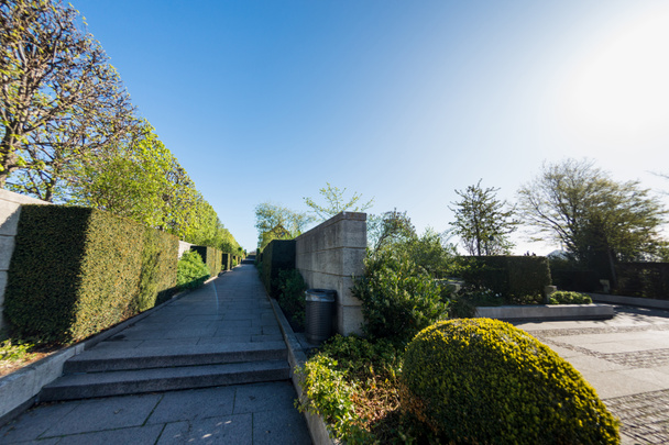 cozy park with green bushes and walkway at sunny day, copenhagen, denmark - Φωτογραφία, εικόνα