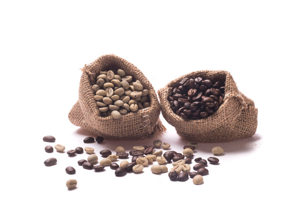 unroasted coffee beans with juta bag on a white backgroud - Photo, Image