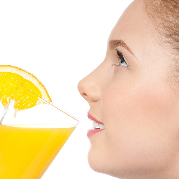Young woman with glass of orange juice isolated - Photo, image